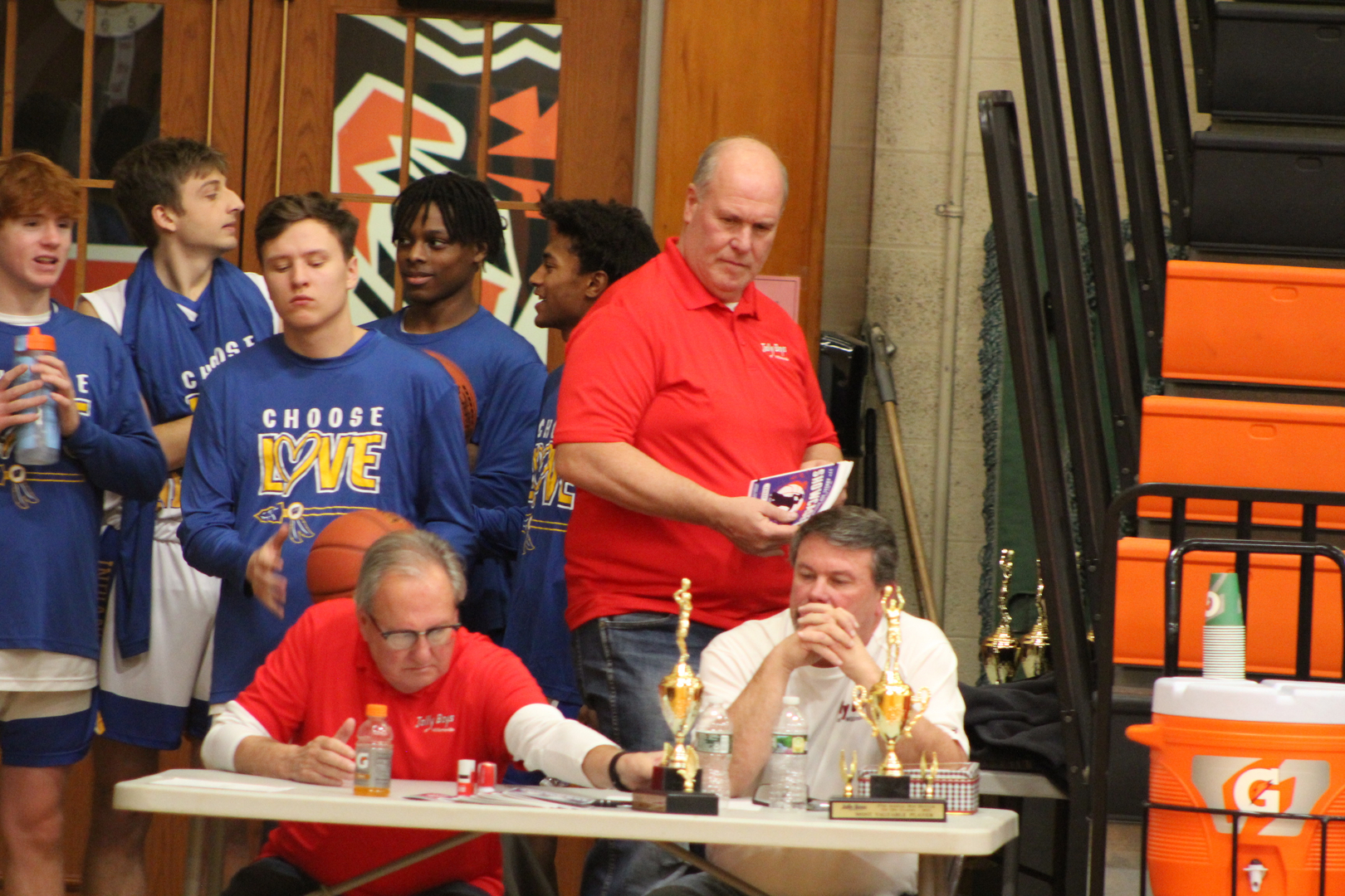 Basketball players and Jolly Boys organizers at a tournament